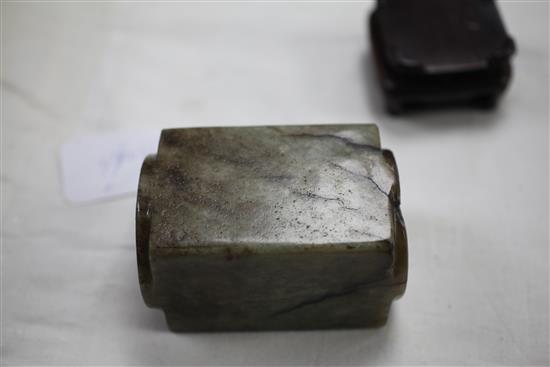 A Chinese grey and black veined jade cong, Ming dynasty, 9.7cm, fitted wood stand